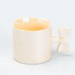 Чашка з ручкою у вигляді бантика керамічна 350 мл Жовта (HP7185Y)