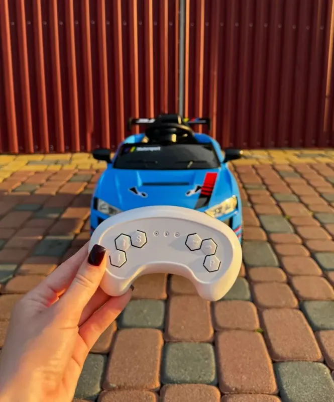 Дитячий електромобіль Cabrio 6V 5A (спойлер, пульт, LED-фари, звук, відкривні двері, педаль газу), Синій ( G538) - изображение 6