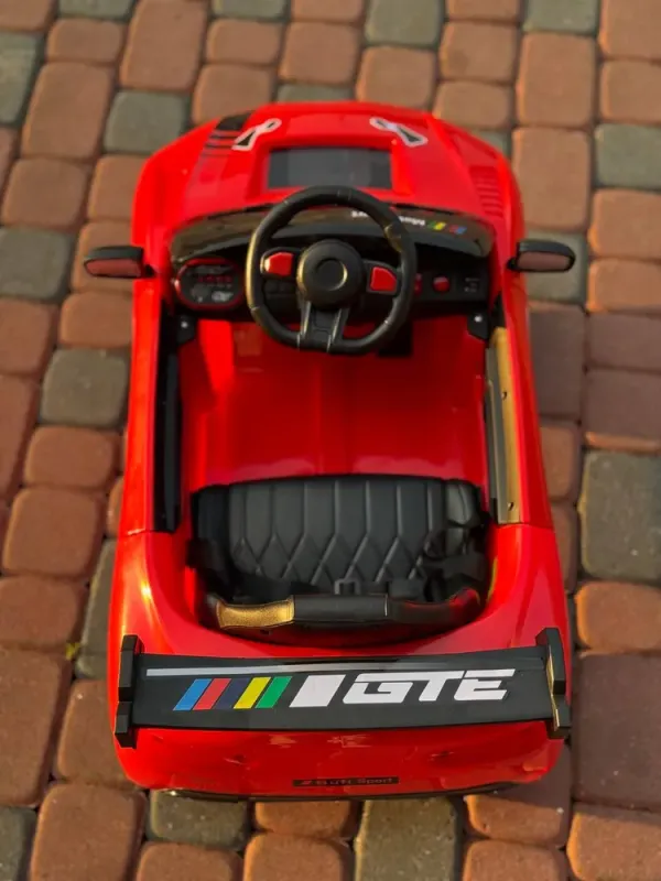 Дитячий електромобіль Cabrio 6V 5A (спойлер, пульт, LED-фари, звук, відкривні двері, педаль газу), Червоний (G538/1) - зображення 6