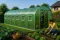 Теплиця садова посилена Primaveo 18 м² (6 × 3 × 2 м) 12 вікон, армована плівка UV-4, оцинкований каркас 24 мм (Зелена) (G1350)