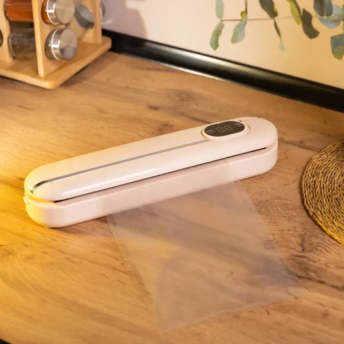 Вакууматор побутовий для сухих і вологих продуктів 300 Вт вакуумний пакувальник з пакетами Рожевий (HP-11-2) - зображення 8